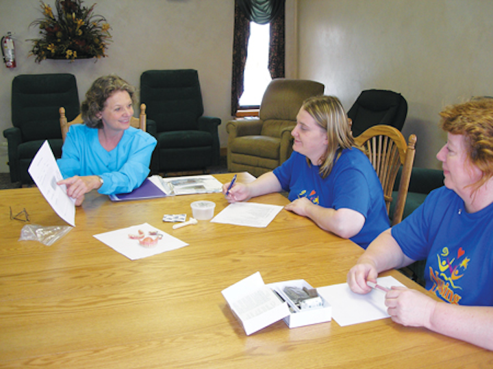 Bringing love to senior smiles Kansas program trains nursing home