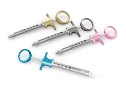 FIgure 4. A comparison of standard (gold), lightweight (aluminum), and smaller (pink, blue) aspirating syringes. FIgure 4. A comparison of standard (gold), lightweight (aluminum), and smaller (pink, blue) aspirating syringes.