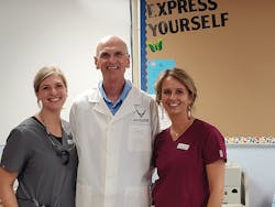 Cara (left), Dr. Stetson (center), and Crystal (right) at a rural elementary school Cara (left), Dr. Stetson (center), and Crystal (right) at a rural elementary school