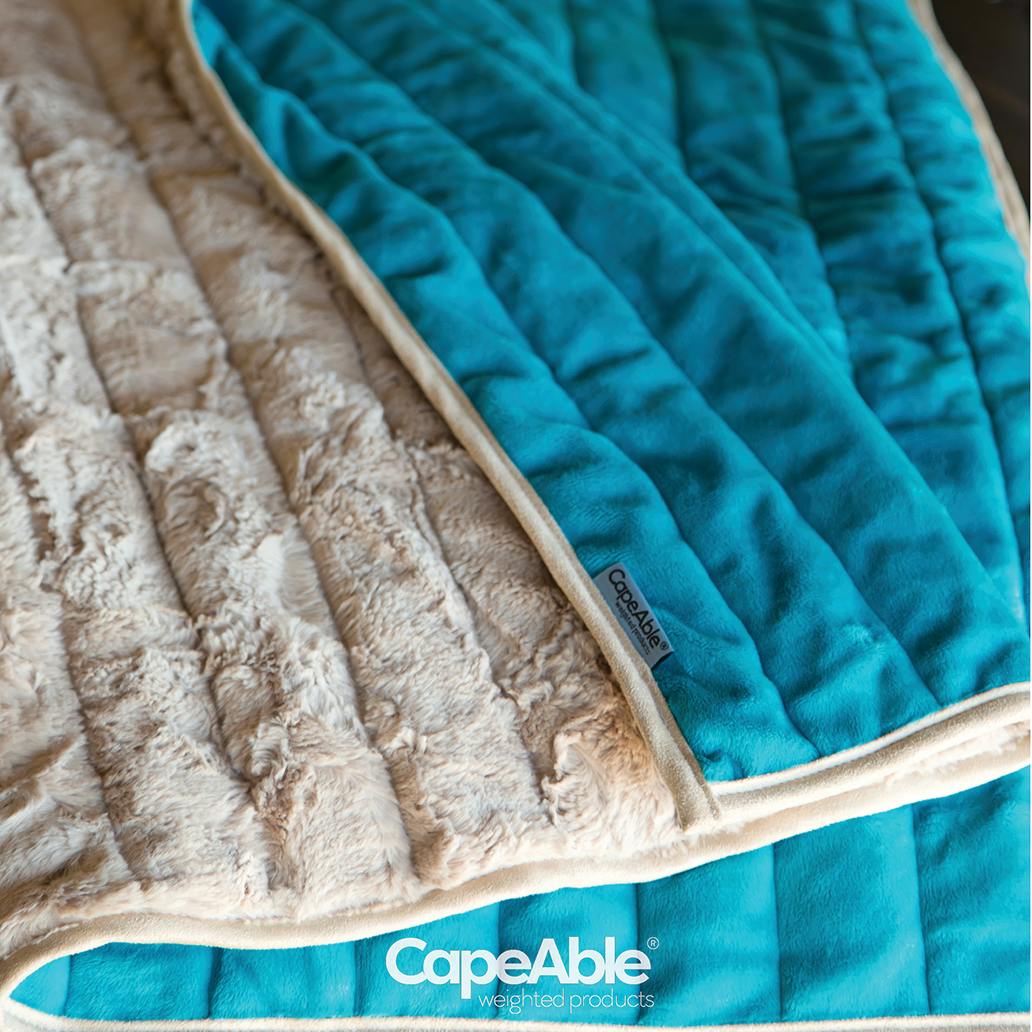 Throw-sized weighted blanket by CapeAble Weighted Products