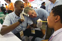 Figure 1: Treating a patient at the Special Olympics Figure 1: Treating a patient at the Special Olympics