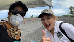 Laura Mallery-Sayre (right) and Grace (left) volunteer to set up traffic cones on the Old Kona Airport landing strip. Laura Mallery-Sayre (right) and Grace (left) volunteer to set up traffic cones on the Old Kona Airport landing strip.