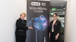 Danielle Clark-Perry, MSc, RDH, and her colleague, Jane L. Forrest, EdD, RDH, pose at the prelaunch of the Oral-B iO toothbrush in Germany.