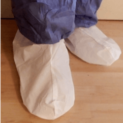 Figure 1: Shoe covers can be disposed of in office. Some claim antibacterial and antiviral properties.