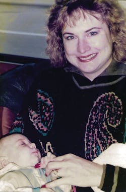 Beth with her infant son, Cam Beth with her infant son, Cam