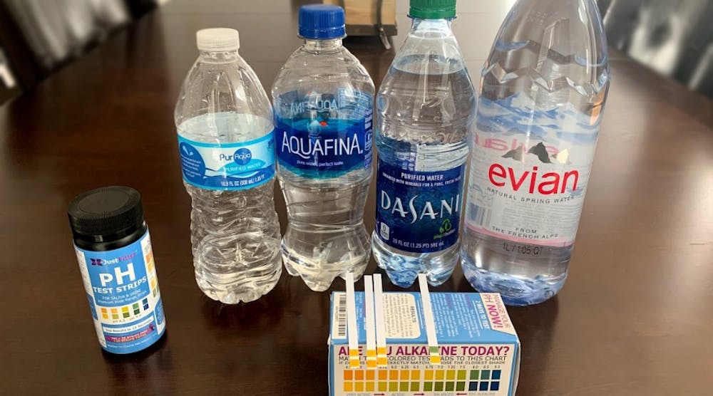 Four of the bottled waters the author tested with the pH results.
