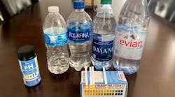 Four of the bottled waters the author tested with the pH results.