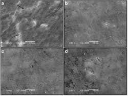 Figure 1: SEM images of enamel surfaces for all groups (x2000): (a) No treatment (control);* (b) MI Varnish; (c) Clinpro White; (d) Duraphat. *Arrows represent crack. Figure 1: SEM images of enamel surfaces for all groups (x2000): (a) No treatment (control);* (b) MI Varnish; (c) Clinpro White; (d) Duraphat. *Arrows represent crack.
