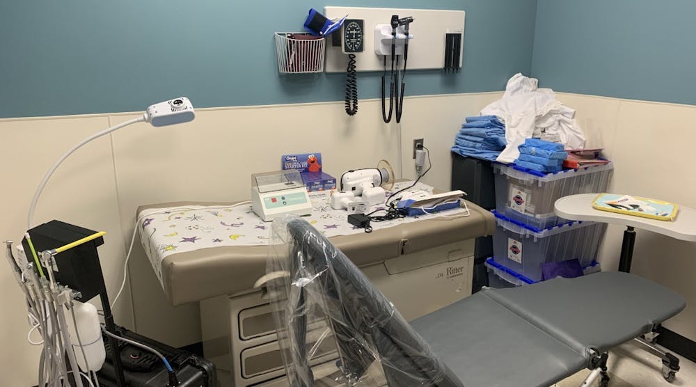 This is the portable setup Brooke Crouch, RDH, uses to integrate care at New Horizons Healthcare Center on its pediatric medical floor. Crouch uses the equipment to examine children who come in for their well-child checkups.