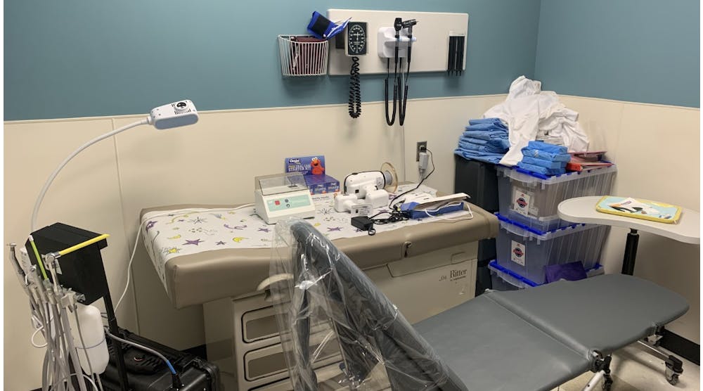This is the portable setup Brooke Crouch, RDH, uses to integrate care at New Horizons Healthcare Center on its pediatric medical floor. Crouch uses the equipment to examine children who come in for their well-child checkups.