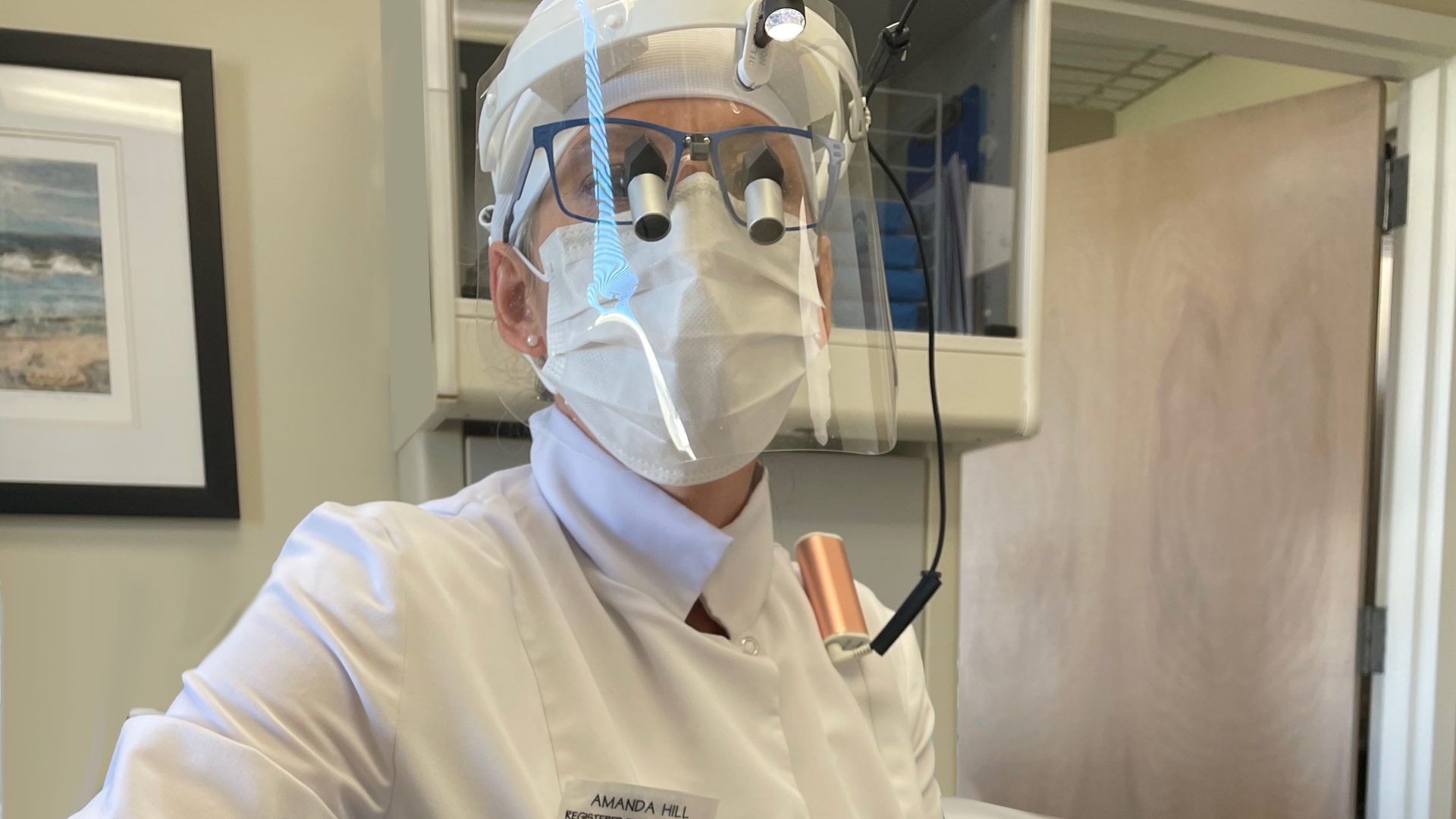 Amanda Hill, BS, RDH, wears pandemic-era PPE. She is wearing a type of loupes (ErgoPrism by LumaDent) that allow her to sit upright and keep plenty of distance between her and the patient. This image first appeared in the March 2020 issue ('Chairside Impact: Sitting pretty with ErgoPrism by LumaDent').