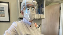 Amanda Hill, BS, RDH, wears pandemic-era PPE. She is wearing a type of loupes (ErgoPrism by LumaDent) that allow her to sit upright and keep plenty of distance between her and the patient. This image first appeared in the March 2020 issue ('Chairside Impact: Sitting pretty with ErgoPrism by LumaDent'). Amanda Hill, BS, RDH, wears pandemic-era PPE. She is wearing a type of loupes (ErgoPrism by LumaDent) that allow her to sit upright and keep plenty of distance between her and the patient. This image first appeared in the March 2020 issue ('Chairside Impact: Sitting pretty with ErgoPrism by LumaDent').