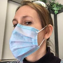 Side view of the author wearing her Cosmo face mask. Side view of the author wearing her Cosmo face mask.