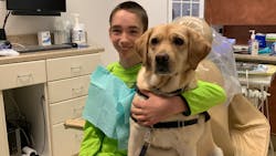 Dylan sitting in the dental chair with Atkins Dylan sitting in the dental chair with Atkins