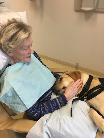Atkins comforts a senior patient