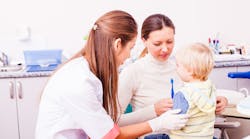 Child And Parent At Dentist Child And Parent At Dentist