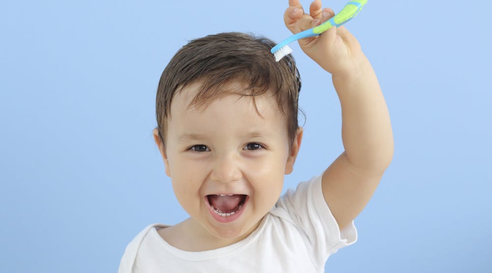Child With Toothbrush