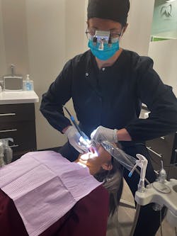 Figure 3: Holding saliva ejector Figure 3: Holding saliva ejector