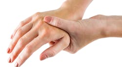 Rubbing Injured Hand Rubbing Injured Hand