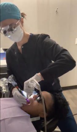 Figure 2. Using excessive pinch force and awkward posture when holding suction Figure 2. Using excessive pinch force and awkward posture when holding suction