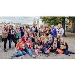 RDHs who worked in Switzerland more than 30 years ago gathered for a recent reunion in Switzerland. They&apos;re holding photos of their friends who weren&apos;t able to make the trip.