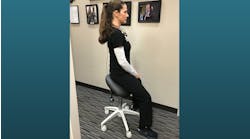 Katrina Klein, RDH, demonstrates her saddle stool.