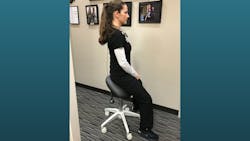 Katrina Klein, RDH, demonstrates her saddle stool. Katrina Klein, RDH, demonstrates her saddle stool.