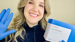 Bethany Montoya demonstrates Cranberry Bio Nitrile gloves Bethany Montoya demonstrates Cranberry Bio Nitrile gloves