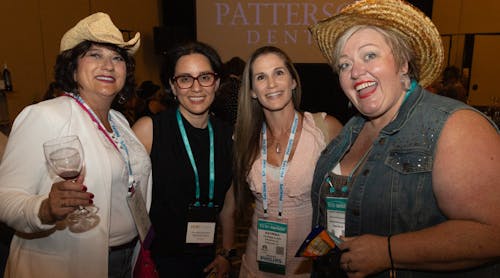 Dental hygienists enjoy each other&apos;s company at the UOR welcome reception, hosted by Patterson Dental.