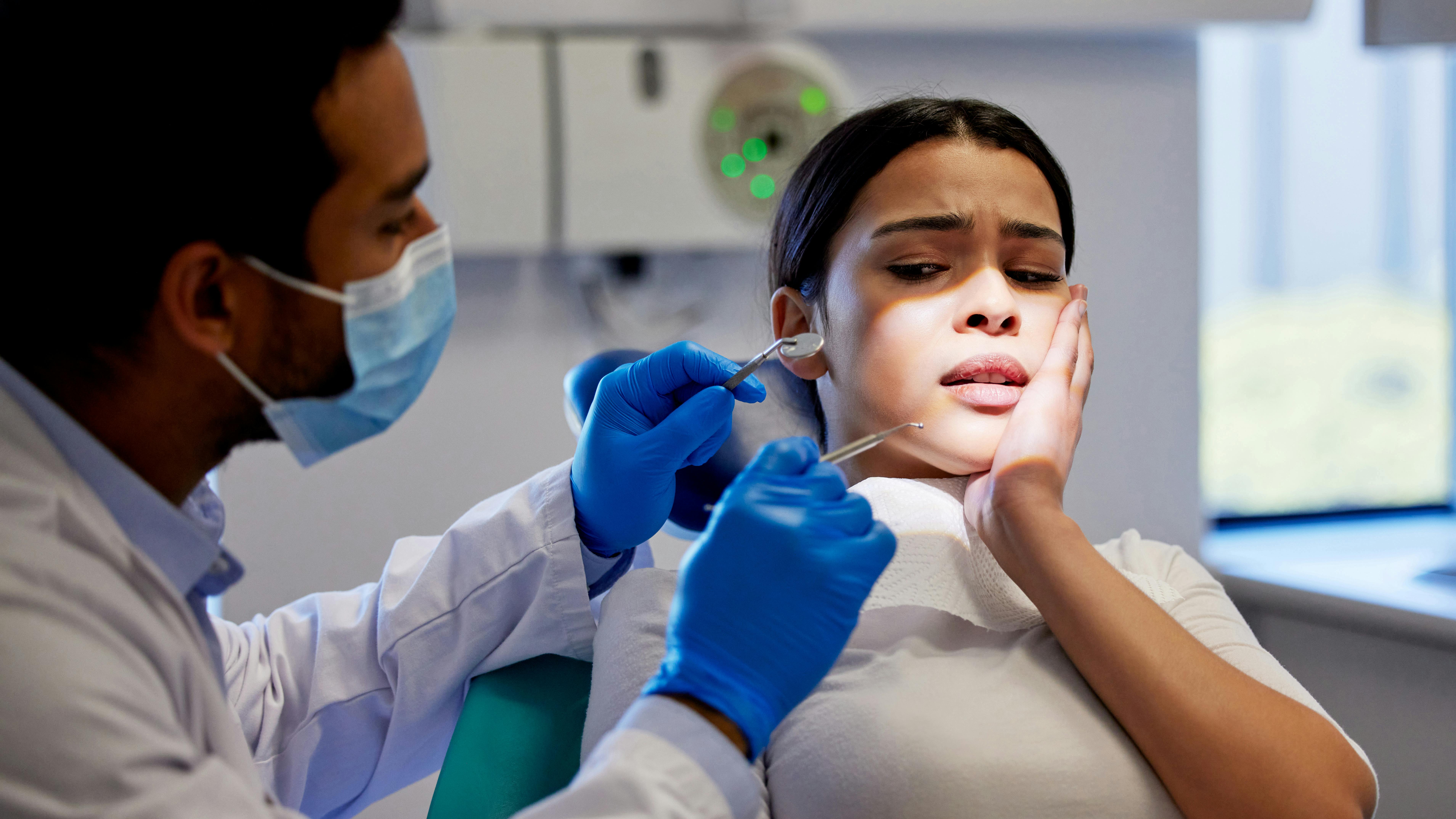 Nervous dental patient in chair