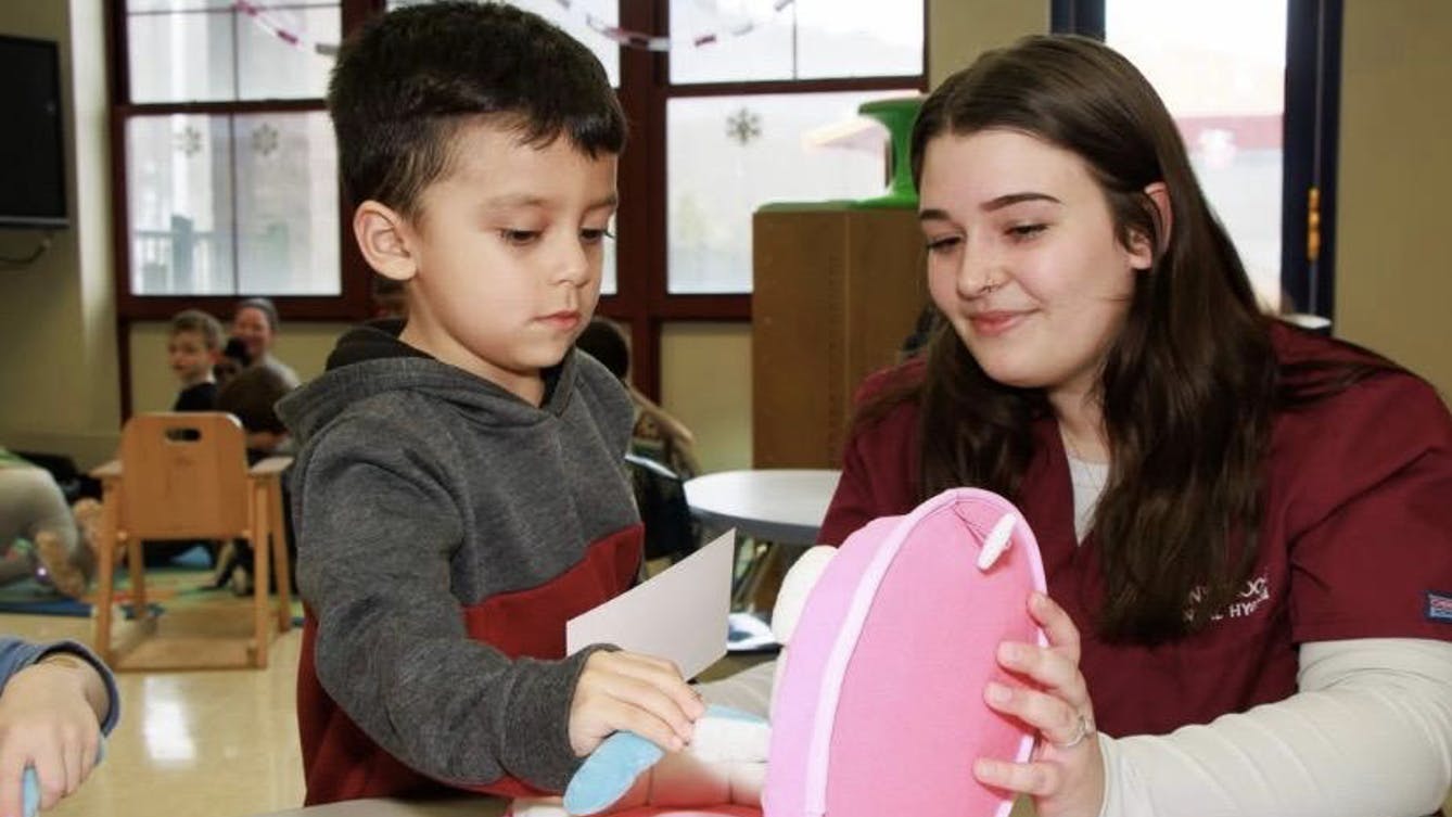 Alexis Wallan enjoyed volunteering with children while she was in dental hygiene school.