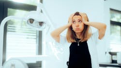 frustrated woman with hands on her head frustrated woman with hands on her head