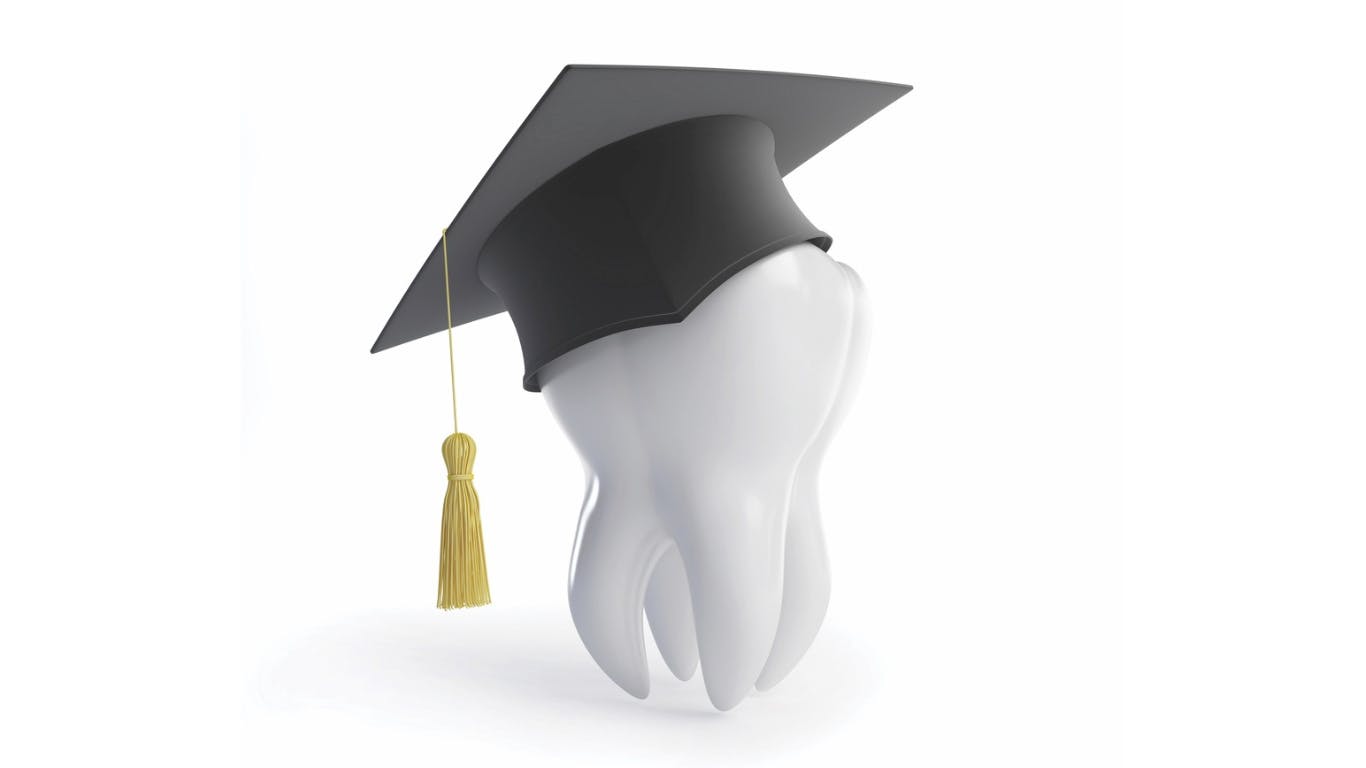 a tooth wearing a mortarboard and tassel to depict dental hygiene education
