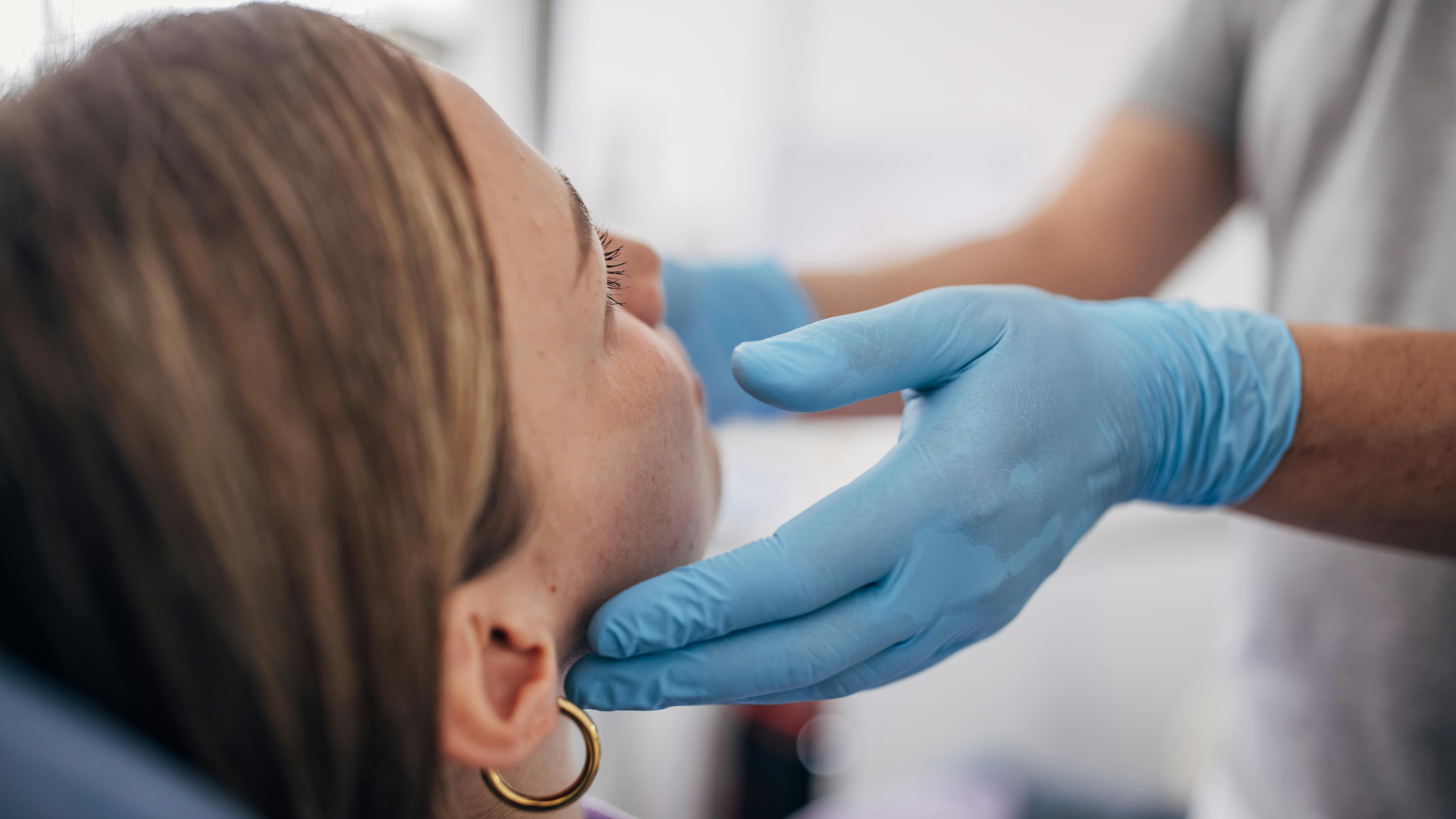 Dental Hygienist Neck Palpation Oral Cancer Screening