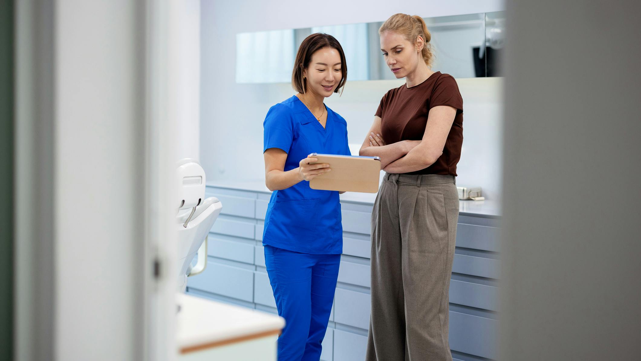 Licensed Dental Hygienist Reviewing Patient Medical History