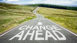 a road that says 'change ahead' a road that says 'change ahead'