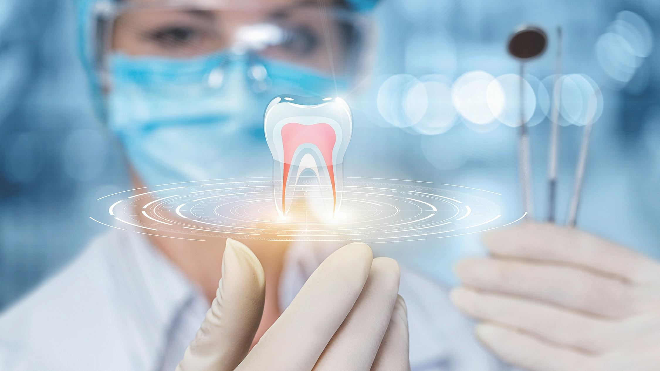 a dental hygienist holding some instruments and an image of a spinning tooth
