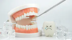 Illustration of tooth sensitivity showing a dental model, dental scaler, ice cubes, and a crying tooth icon to represent cold sensitivity and dental pain.