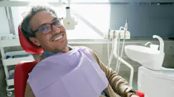 a smiling dental patient