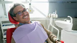 a smiling dental patient
