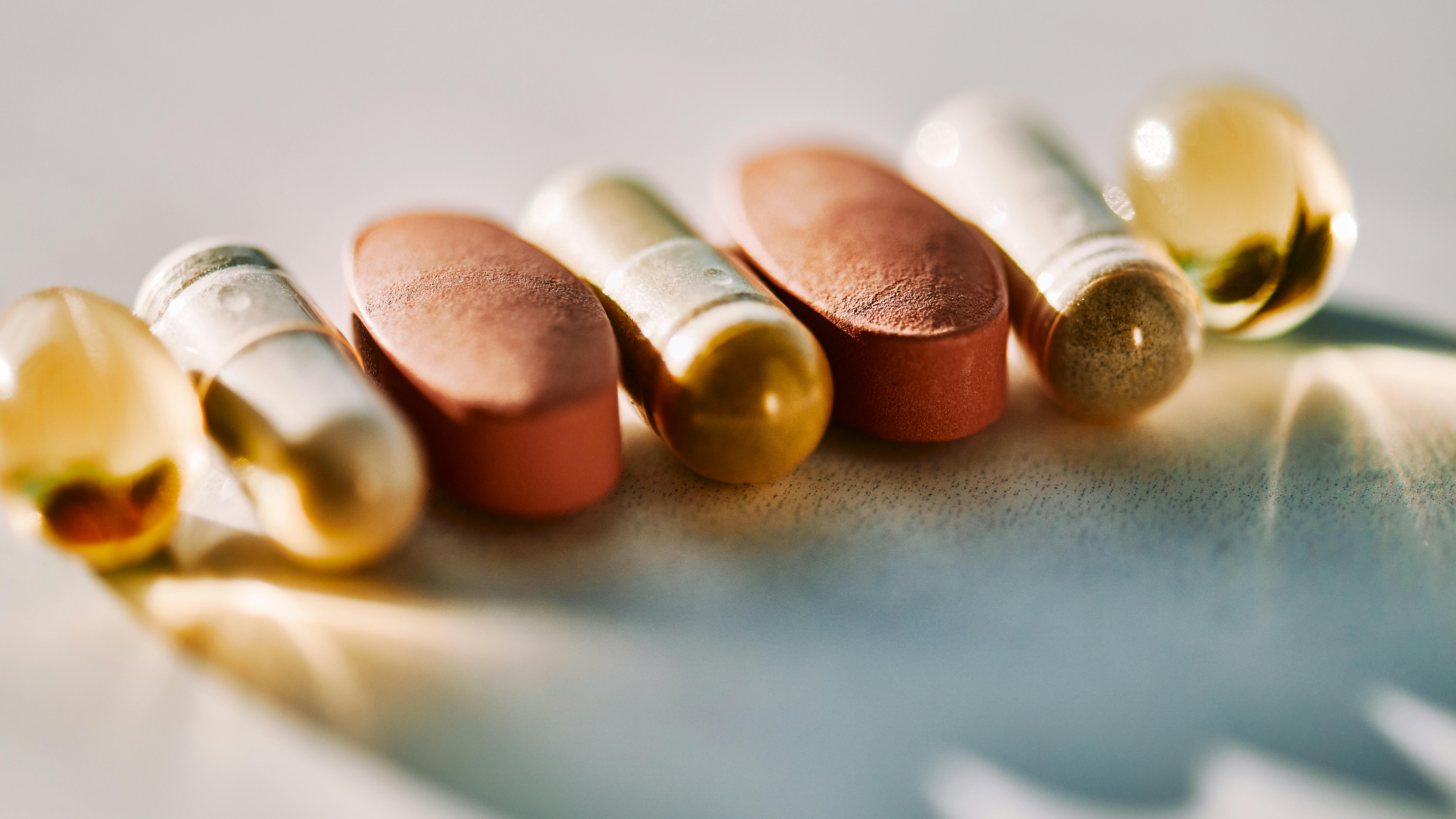 some medications and supplement pills lined up