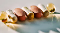 some medications and supplement pills lined up