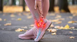 woman's feet (outside) indicating the pain she's experiencing